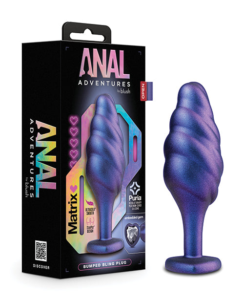 Purple anal plug with packaging labeled 'Anal Adventures' on a white background