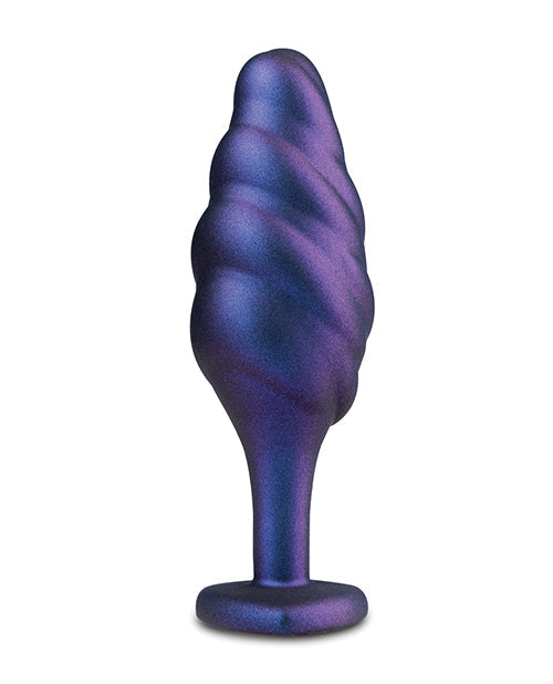 Purple swirl-shaped object on a white background