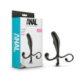 Black curved object with 'Anal Adventures' packaging on a white background