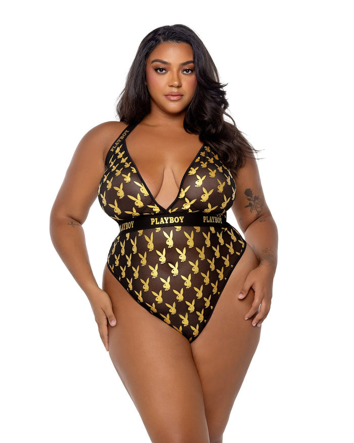 Woman wearing a Playboy branded swimsuit on a white background