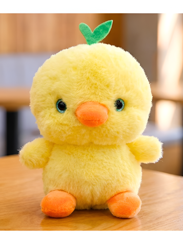 Cute Yellow Chick Plush Toy with Green Leaf Sprouts.