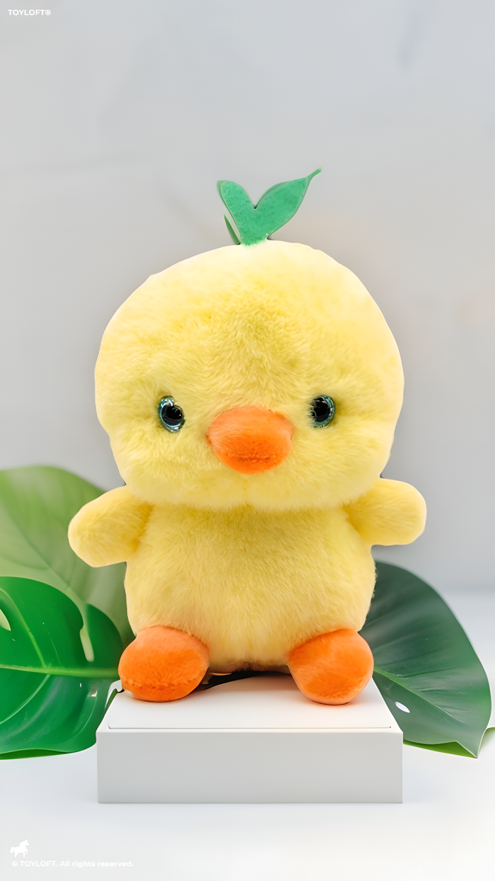 Cute Yellow Chick Plush Toy with Green Leaf Sprouts.