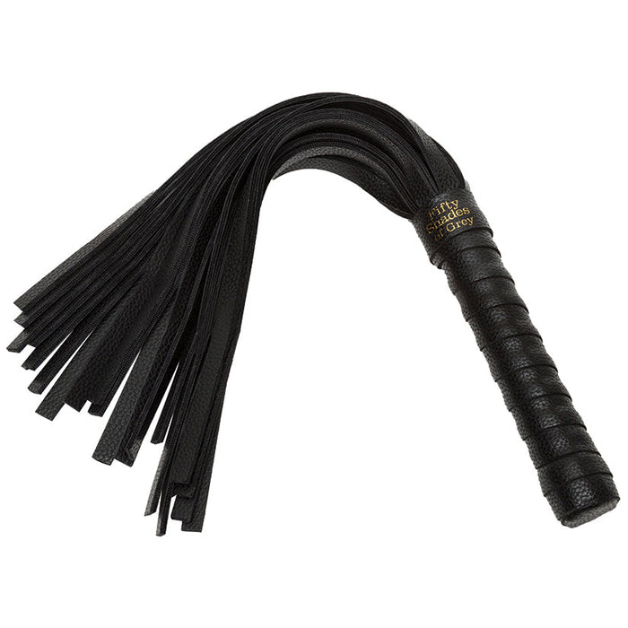 Black leather flogger with a handle on a white background